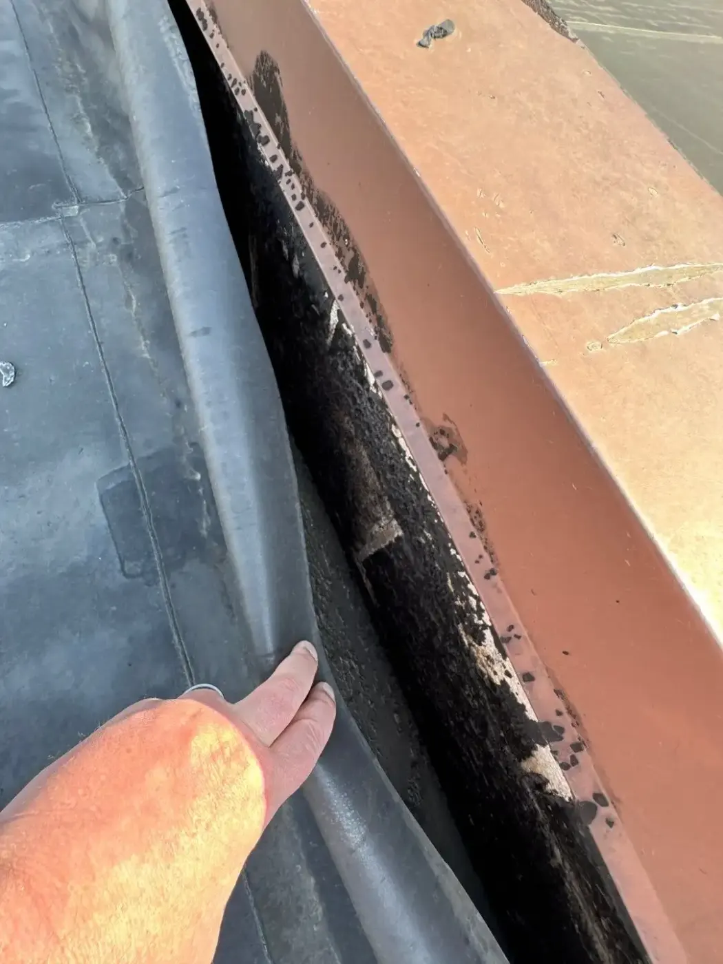 Tarping and dry-in on a Michigan City commercial roof